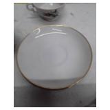 Porcelain Tea Set with Rose Pattern and Gold Trim, 3 cups, 4 saucers