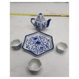 Blue and White Porcelain Tea Set with Floral Design