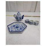 Blue and White Porcelain Tea Set with Floral Design