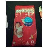 Huggies Size Newborn Diapers, Little Snugglers Baby Diapers, Size Newborn (up to 10 lbs), 31 Count, Packaging May Vary