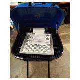 Walk-A-Bout Portable Charcoal Grill in Grills Outdoor Portable Charcoal Grill ITEM IS NEW BUT BANGED UP A LITTLE.  - Retail: $130