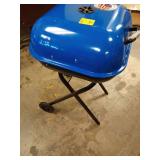 Walk-A-Bout Portable Charcoal Grill in Grills Outdoor Portable Charcoal Grill ITEM IS NEW BUT BANGED UP A LITTLE.  - Retail: $130