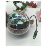 Holiday Decor of: Wooden merry go round with working music box; 2 Elves, NASCAR #8 Dale Jr., Hallmark train ornament. 5 items in lot