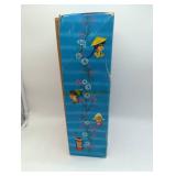 German Made Vinyl Doll in Plaid Uniform, in original box, Vintage.