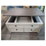 Signature Design by Ashley Bolanburg 4 Drawer Coffee Table with Lift Top  Two-tone Brown - Some Scratches & Missing Wheel  - Retail: $759