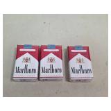 3 unopened packs of Marlboros