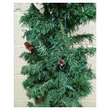 Artificial Christmas Tree in Decorative Urn