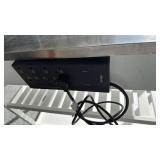 White kitchen island with metal top and 2 drawers 33x44x21 has electrical outlet