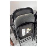 7 Costco steel folding chairs (one padded)