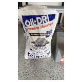 Oil Dry premium absorbent 3/4 full and Rubbermaid bucket with cat litter