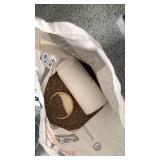 Oil Dry premium absorbent 3/4 full and Rubbermaid bucket with cat litter