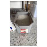 Oil Dry premium absorbent 3/4 full and Rubbermaid bucket with cat litter