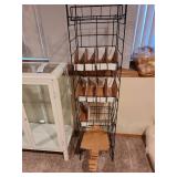 Black metal wire organizer rack. 64x16x15, plus cardboard display boxes