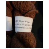 12 skeins 100 pct. 2-ply sport Alpaca yarn, appx. 200 yards, dark brown color
