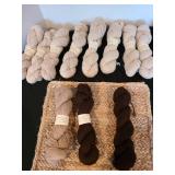 100 pct. 2-ply sport Alpaca yarn, appx. 200 yards each skein, 9 light fawn, 1 fawn, 2 bay black color, total of 12 skeins