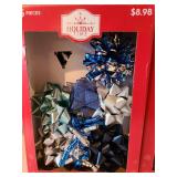 Holiday premium gift bows in boxes.