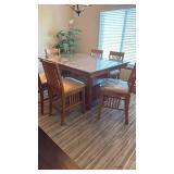 High top table w/cabinet has beveled glass top 30x48x36, 6 chairs 40x20 seat 24 in (chairs have plastic covers)