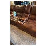 4 pc leather sectional with recliner, lounger and cup holders with furniture care kit (few cat scratches) 36x124x36 total, located in basement