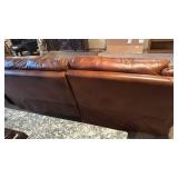 4 pc leather sectional with recliner, lounger and cup holders with furniture care kit (few cat scratches) 36x124x36 total, located in basement