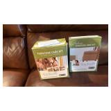 4 pc leather sectional with recliner, lounger and cup holders with furniture care kit (few cat scratches) 36x124x36 total, located in basement