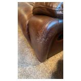 4 pc leather sectional with recliner, lounger and cup holders with furniture care kit (few cat scratches) 36x124x36 total, located in basement