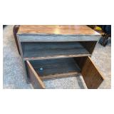 TV stand 25x29x15.5 located in basement