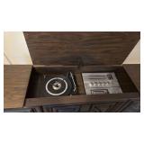 Stereo cabinet 27x60x16 located in basement