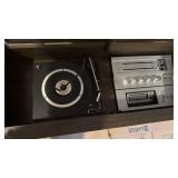 Stereo cabinet 27x60x16 located in basement