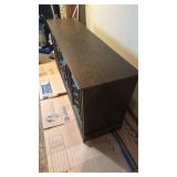 Stereo cabinet 27x60x16 located in basement