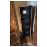 Cabinet with adjustable shelves located in basement 45x11x10