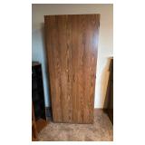 Storage cabinet with 2 doors no key 71x30x17 located in basement