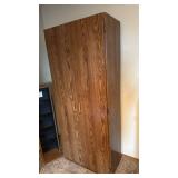 Storage cabinet with 2 doors no key 71x30x17 located in basement