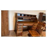 2 pc roll top desk 48x49x22 with chair very nice located in basement