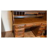 2 pc roll top desk 48x49x22 with chair very nice located in basement