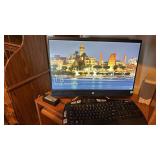 HP all in one computer with Intel Core 13, Logitech keyboard and speakers located in basement