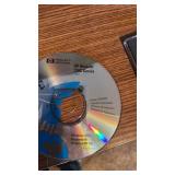 HP all in one computer with Intel Core 13, Logitech keyboard and speakers located in basement