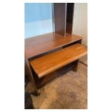 Office desk on rollers 55x36x20 located in basement