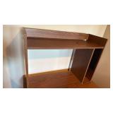 Office desk on rollers 55x36x20 located in basement