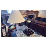 Desk lamp with electrical outlets and telephone jacks 25x8.5x8.5 located in basement