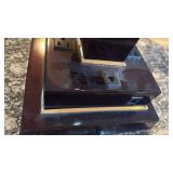 Desk lamp with electrical outlets and telephone jacks 25x8.5x8.5 located in basement