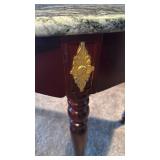 Half moon entry table with stone top 31x47x21.5 located in basement