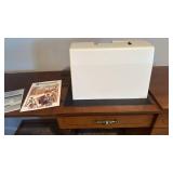 Husqvarna Viking 400 computer sewing machine, cover and sewing cabinet and accessories 30x70x20.5 fully extended located in basement