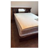 Big Sur queen waterbed base with drawers, Stearns & Foster pillow top mattress and foam topper located in basement