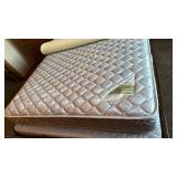 Big Sur queen waterbed base with drawers, Stearns & Foster pillow top mattress and foam topper located in basement