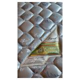 Big Sur queen waterbed base with drawers, Stearns & Foster pillow top mattress and foam topper located in basement