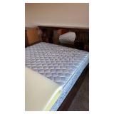 Big Sur queen waterbed base with drawers, Stearns & Foster pillow top mattress and foam topper located in basement