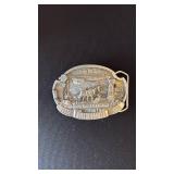 2 Hoisington Centennial belt buckles