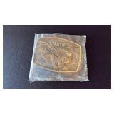 Troy Built and 25th Anniversary Excel belt buckles