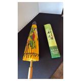 Japanese paper parasol and cane wall scroll calendar