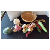 Wood bowl with ceramic fruit on rope